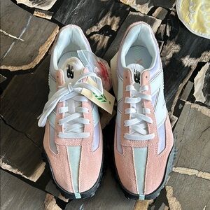 New Balance Women's size 11/men’s size 9.5 Pink and White Sneakers